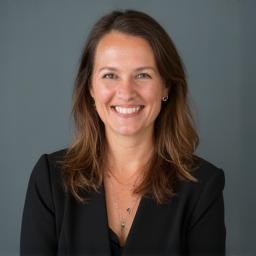 Professional headshot of Elara Vance, Creative Director at Pixel Pulse Studio
